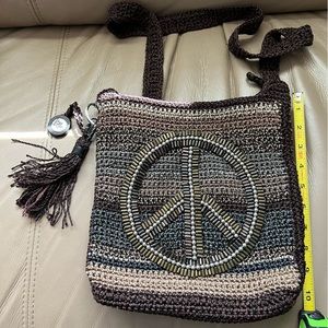 Peace sign bead motif